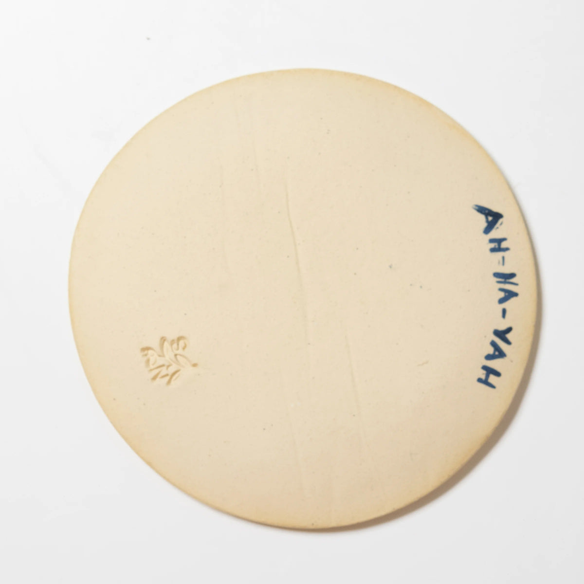 Back of the Love word plate showing pale clay, an impressed maker’s mark, and handwritten AH-VA-YAH lettering.