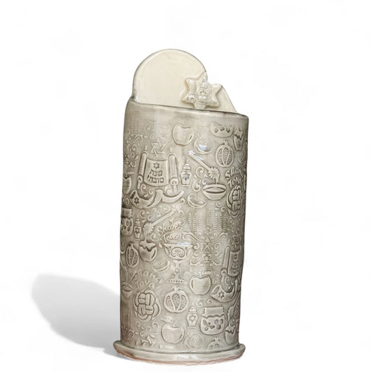 Front view of a Shana Tova stoneware vase with Rosh Hashanah motifs and a raised back topped with a Star of David.