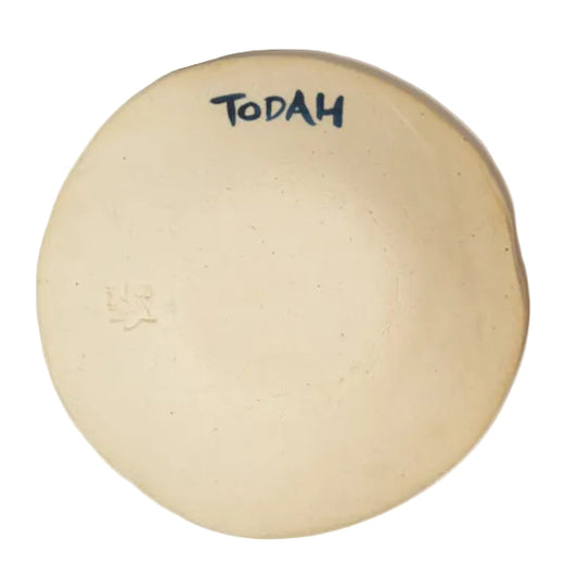 Back of the Thank You word plate showing pale clay, handwritten TODAH lettering, and an impressed maker’s mark.